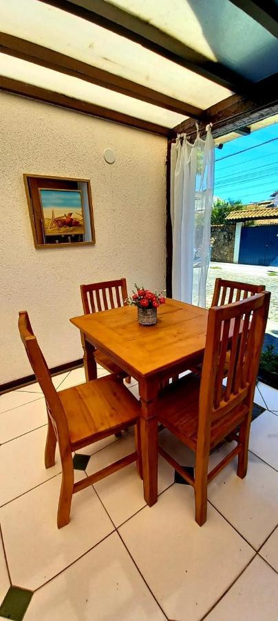 Bliss Hoteis Centro Búzios Εξωτερικό φωτογραφία A dining room table with four chairs