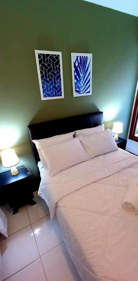 Bliss Hoteis Centro Búzios Εξωτερικό φωτογραφία A bed with two pillows